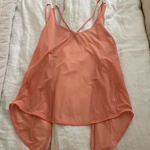 Lululemon rare not sold online tie back tank! Pink! Size 8/but adjustable string